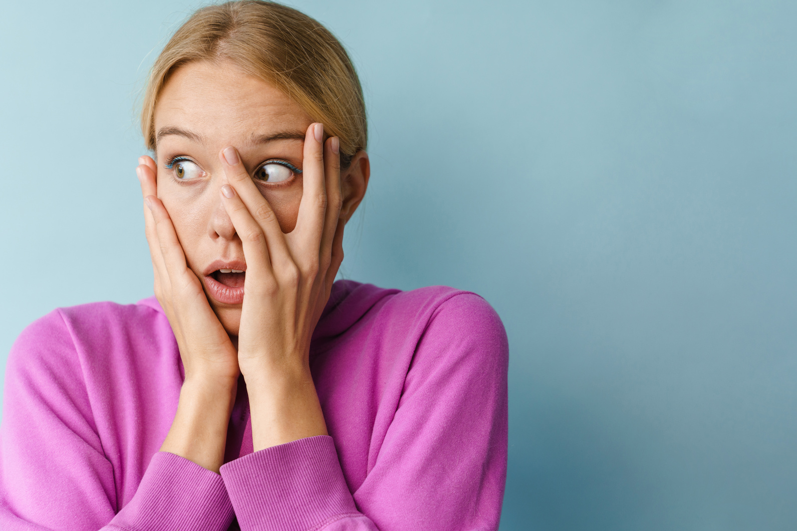 Close up Portrait of a Shocked Pretty Girl Screaming